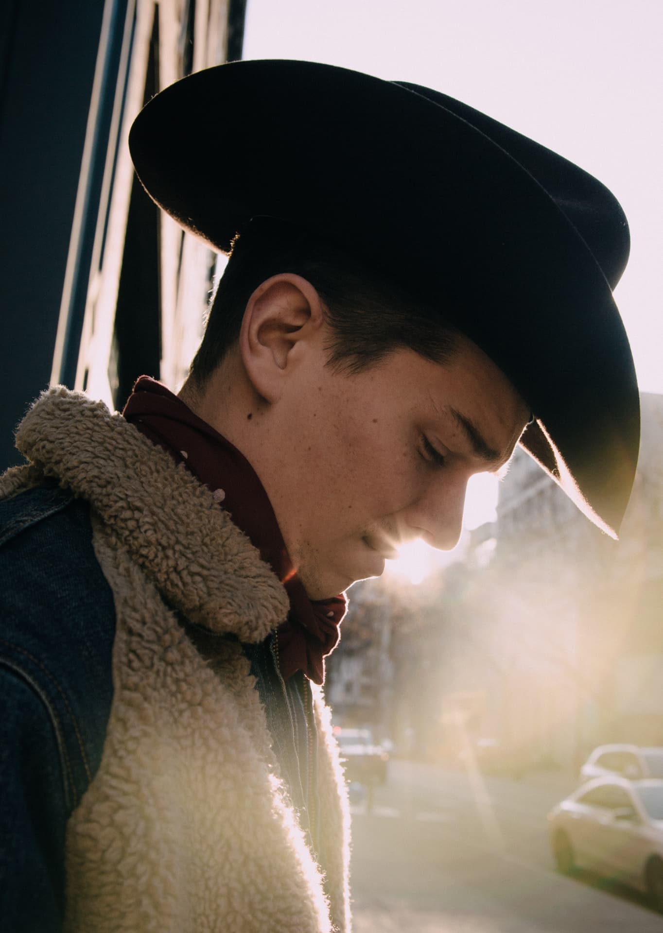 Backlit golden-hour street portrait